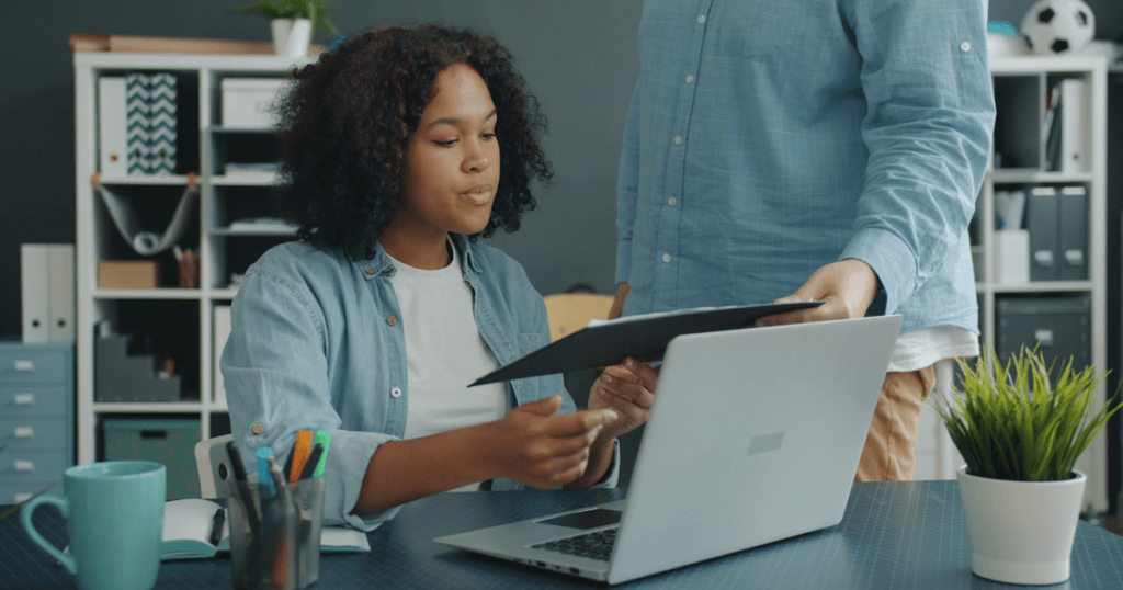 SOC 2 compliance checklist review at a small business desk