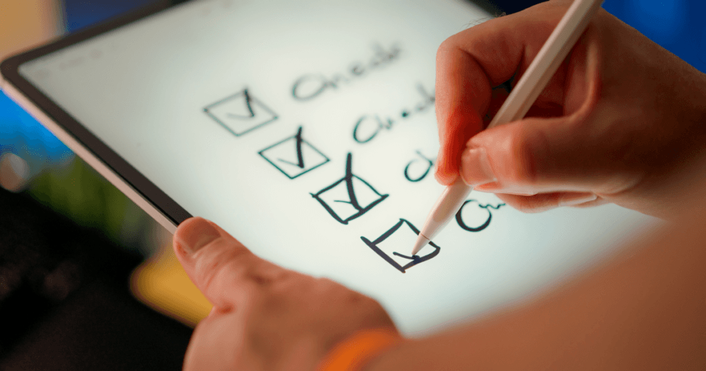 A business owner ticking items off a SOC 2 controls list